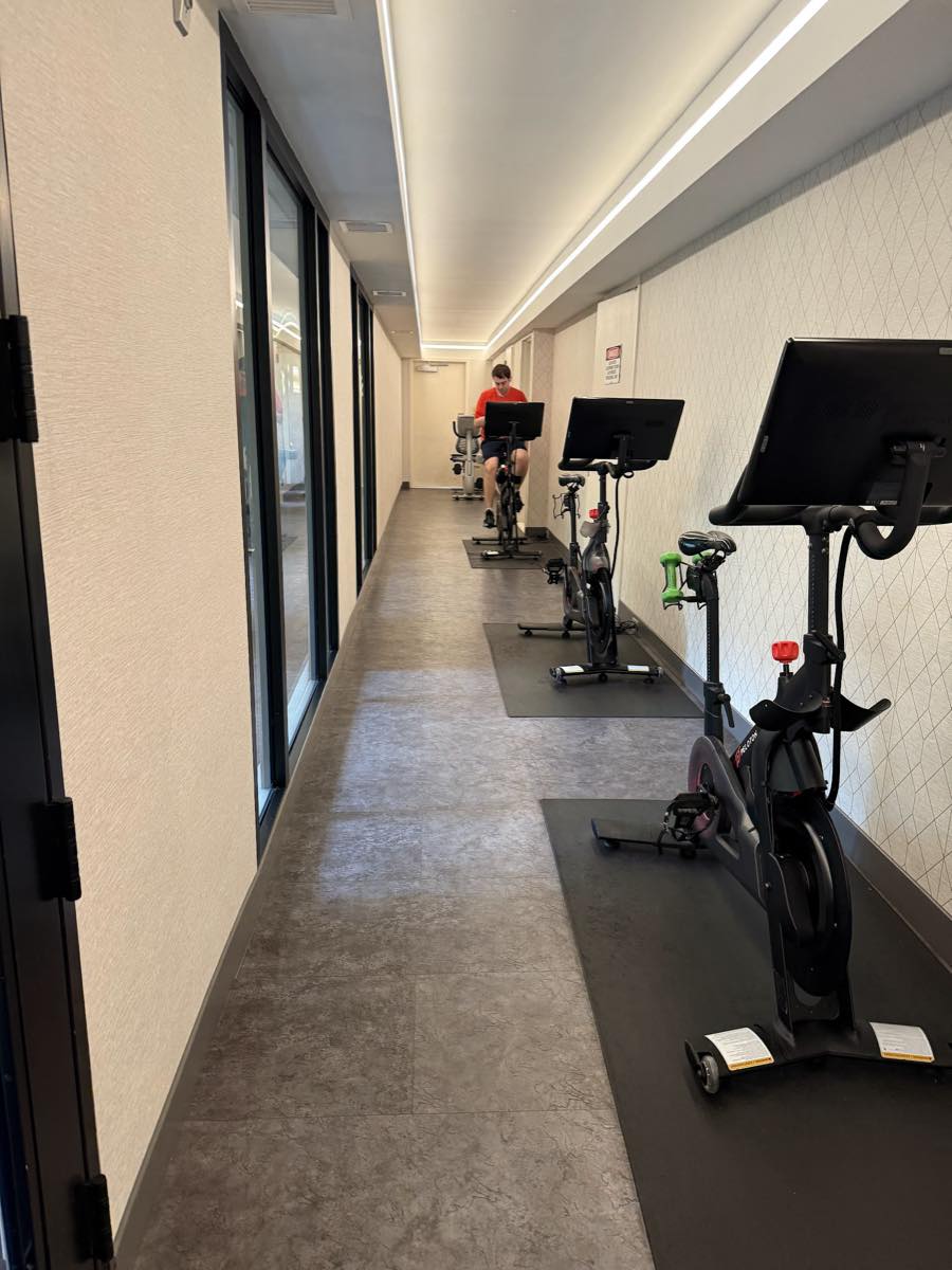 A narrow hallway leading off the gym