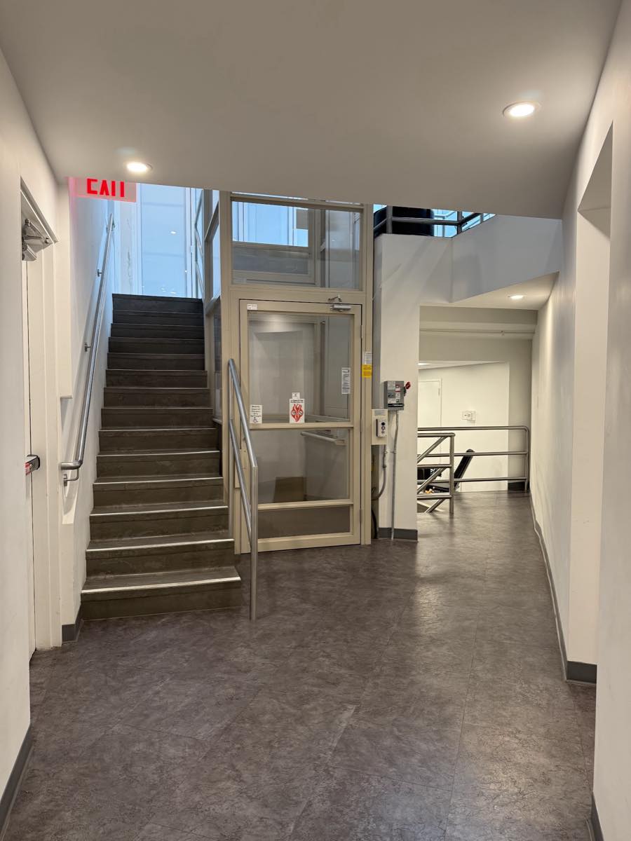 The first flight of stairs up to the roof